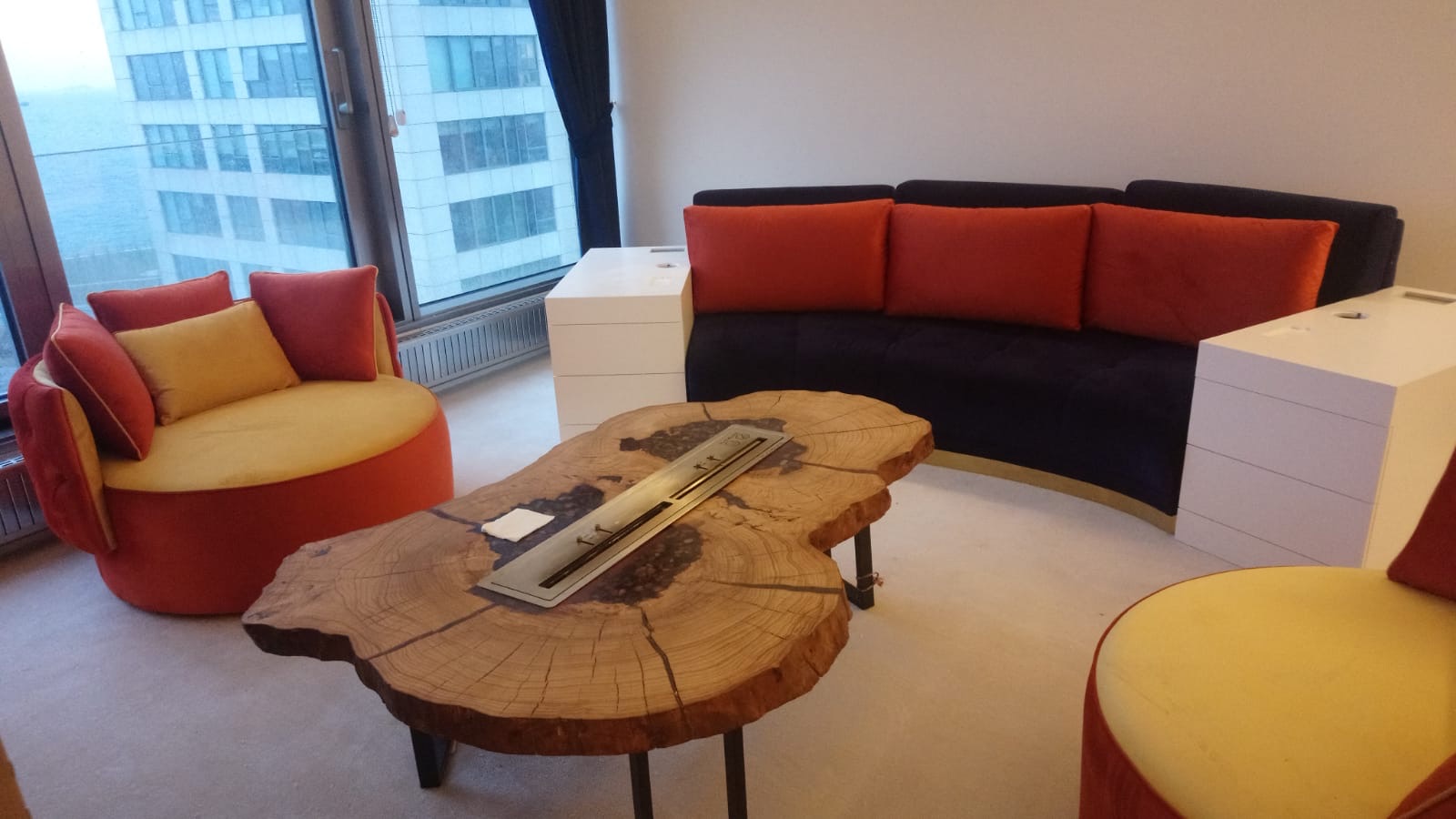 Live-edge walnut coffee table with integrated ethanol fireplace