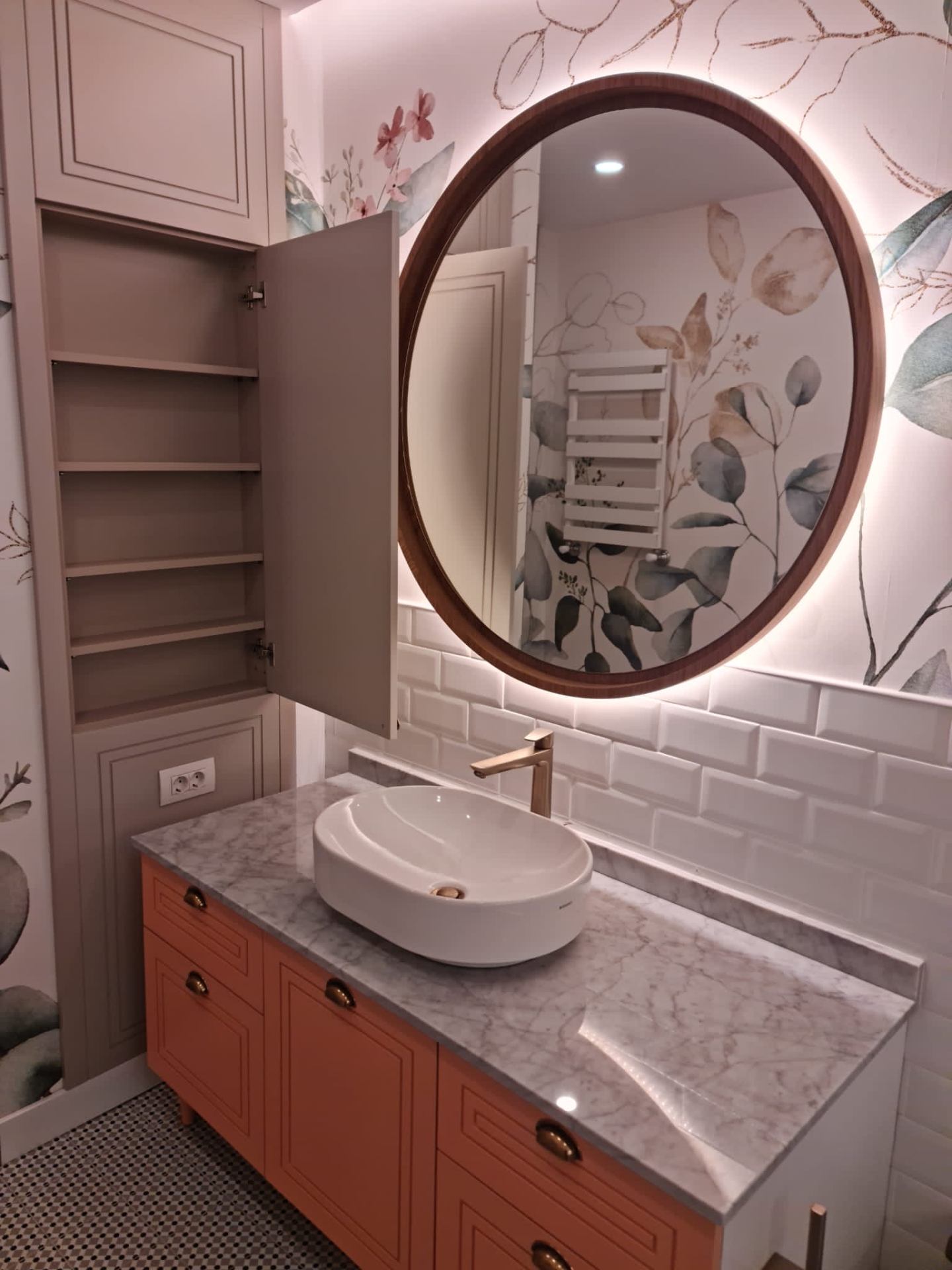 Bespoke storage column paired with vessel basin and botanical mural