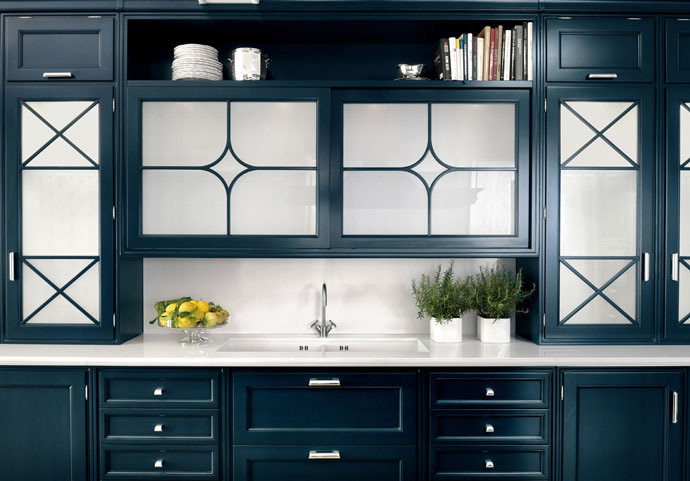 Astral fretwork glazed cabinetry in deep navy lacquer