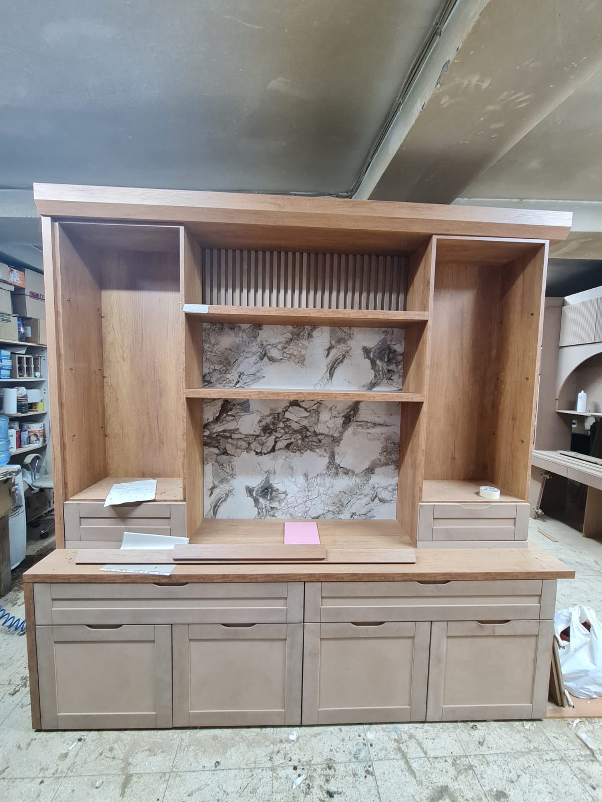 Dressing unit prototype with marble backing and fluted panels