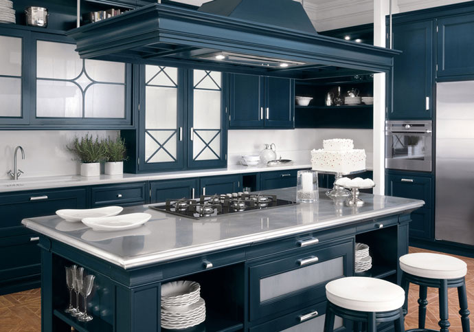 Navy island with statement canopy hood and marble worktop