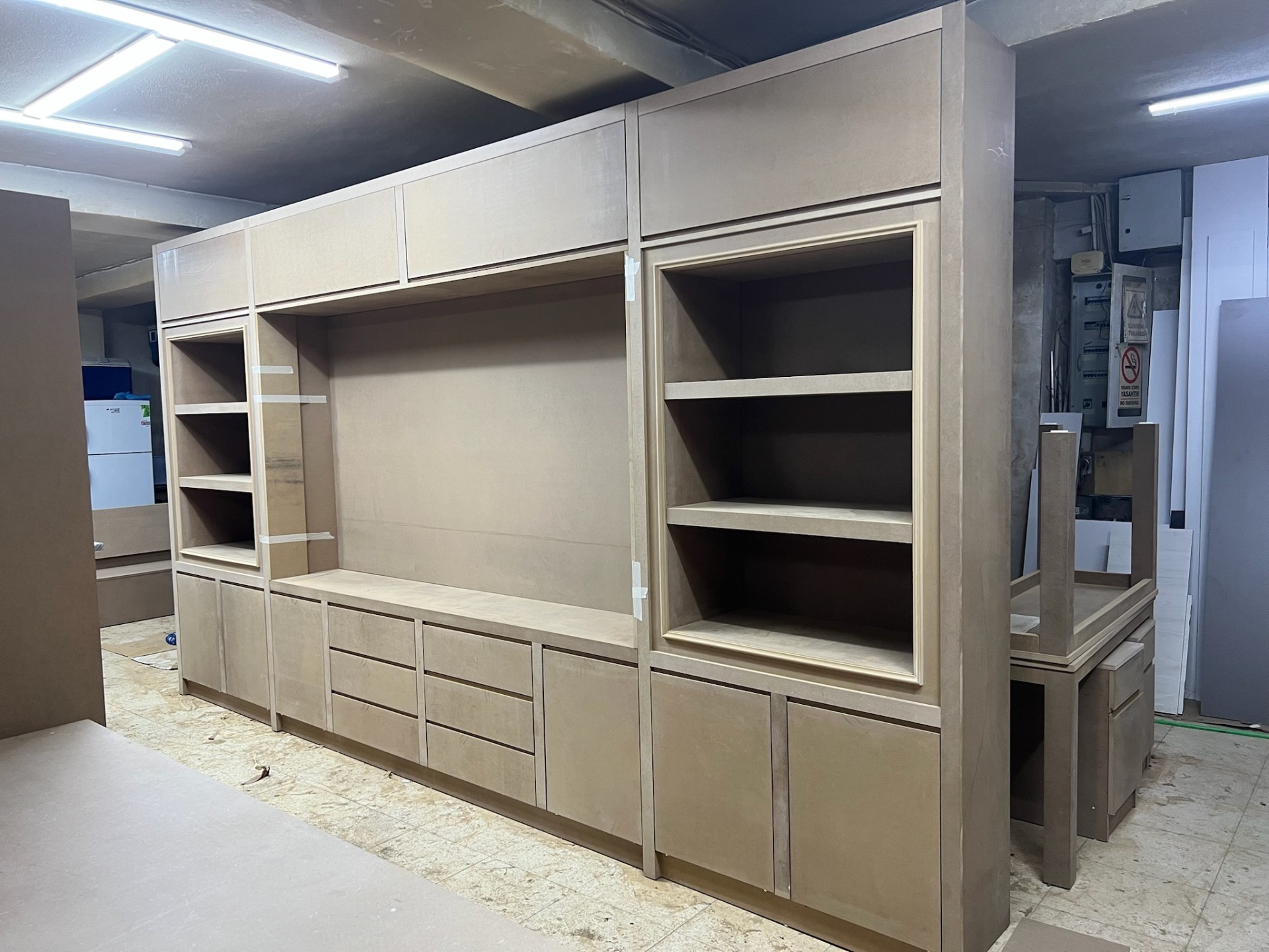 Classical framed media wall with symmetrical display cabinets — pre-lacquer